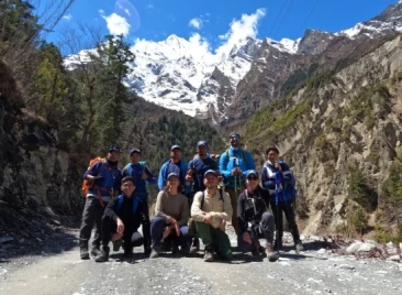 Group of trekkers on mountain road