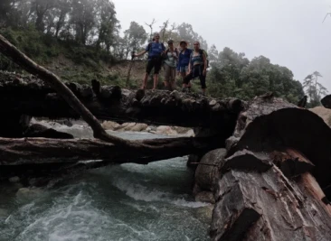 Group photo while crossing river