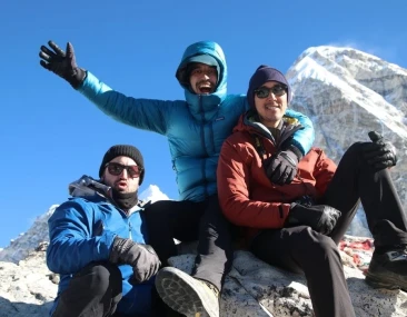 trekkers at the summit of Kala Patthar