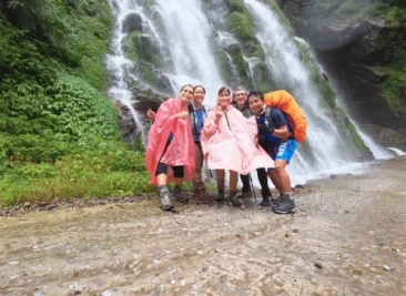 Picture at waterfall during trek