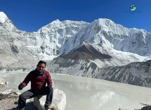 Trekker at Imja Tsho Lake Viewpoint